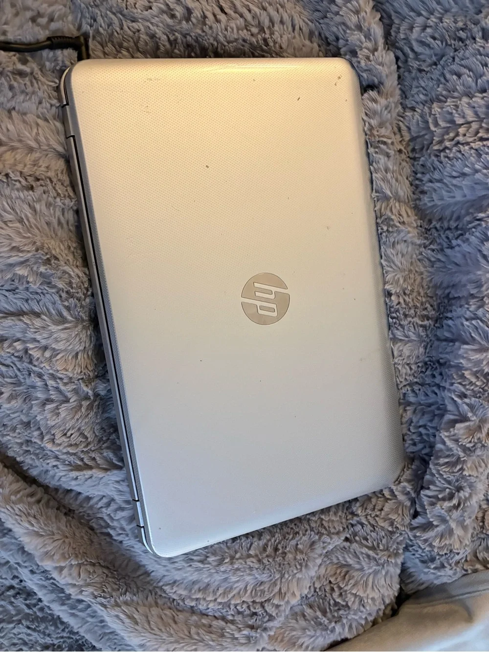 HP Black Laptop with Glossy Black Bezel and Matte Black Keyboard